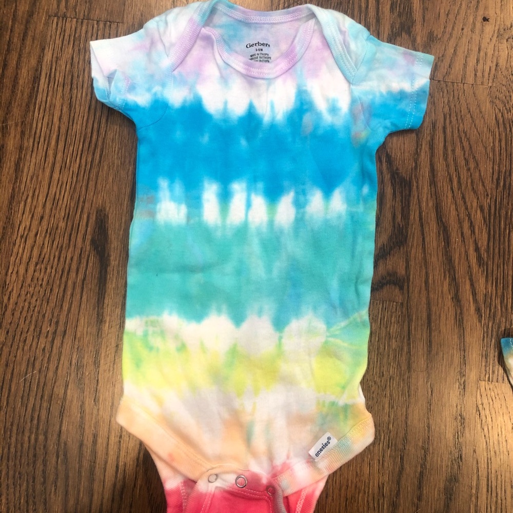 Rainbow tie dye onesie